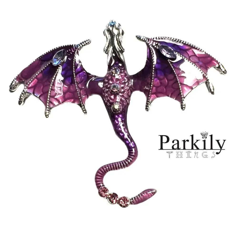 Brooch dragon in purple adorned with sparkly crystals on a silver pin